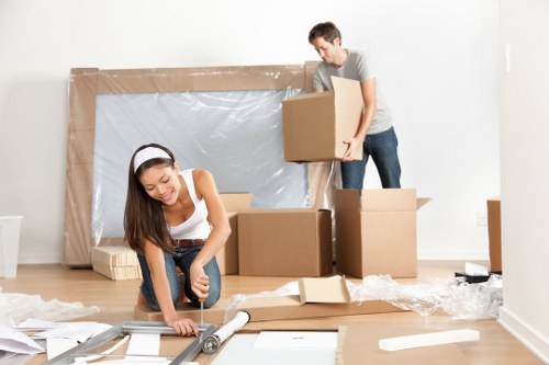 Professional flat removals in Strand with moving boxes and careful handling