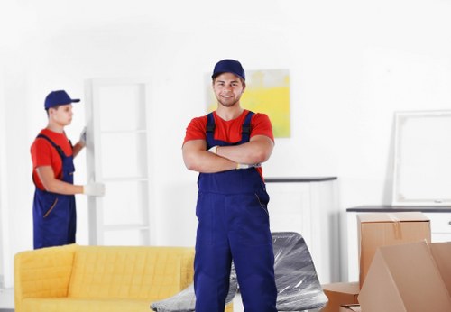 Planning house removals in Strand with moving boxes and furniture