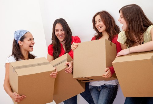 Professional moving team handling house removals in Strand