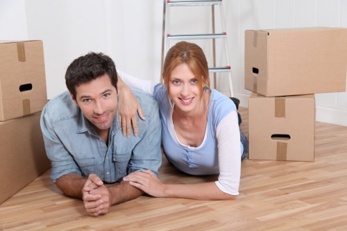 Professional movers loading boxes for same day relocation in Strand