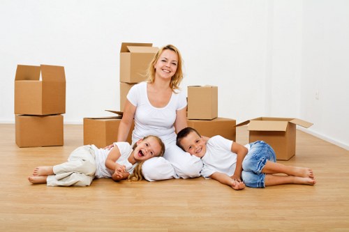 Commercial office boxes and equipment ready for transport in Strand