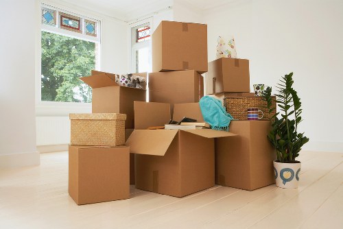 Careful packing for house removals in Strand with labeled boxes