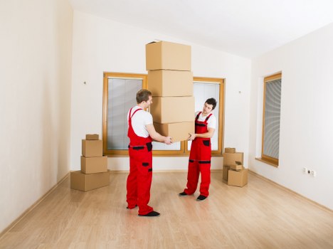 Packed boxes and furniture prepared for strand removals